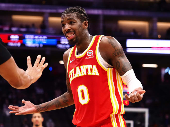 Jan 5, 2022; Sacramento, California, USA; Atlanta Hawks guard Delon Wright (0) questions the referee after a play against the Sacramento Kings during the fourth quarter at Golden 1 Center.